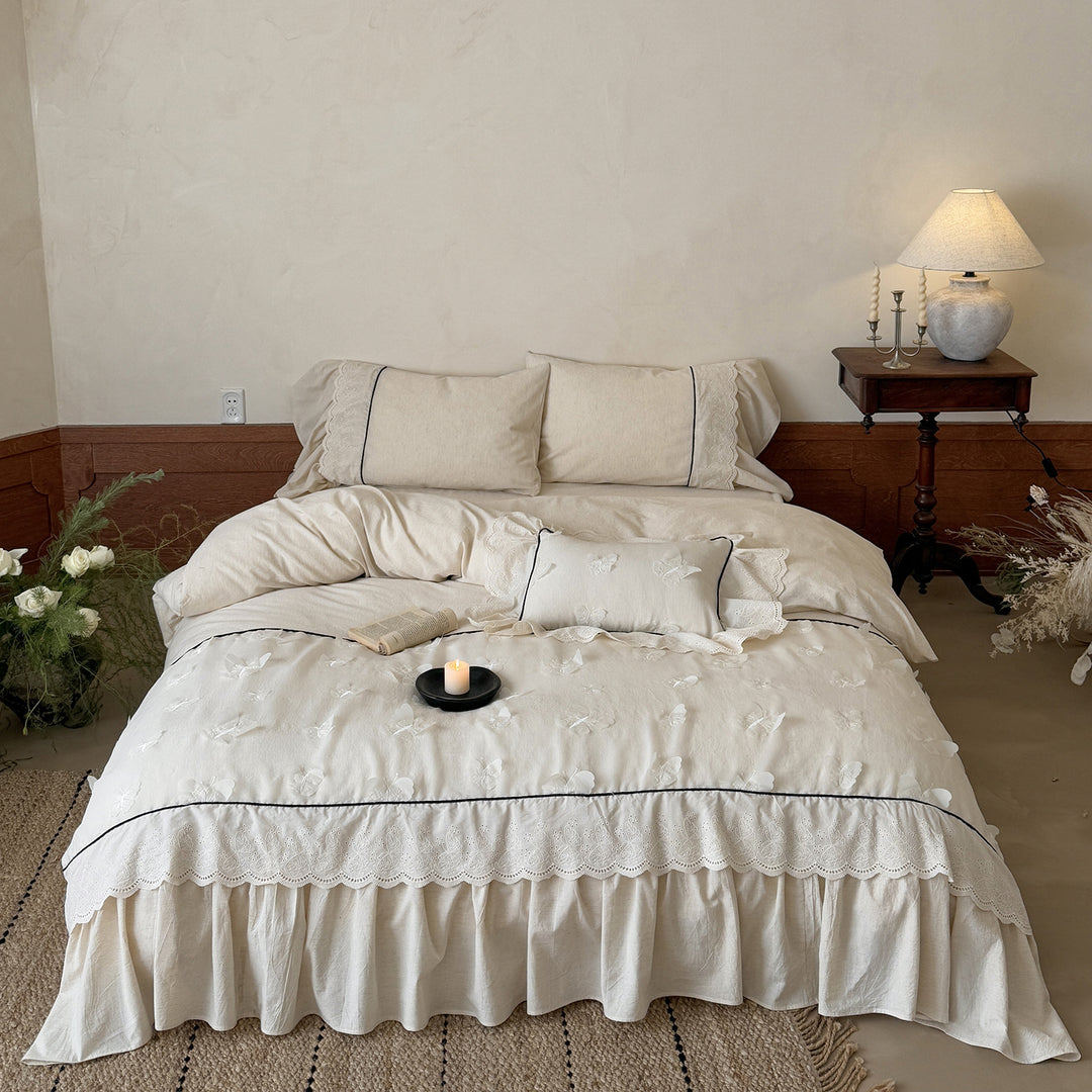 Romantic cotton bedding set with embroidery, lace frill, and fine piping