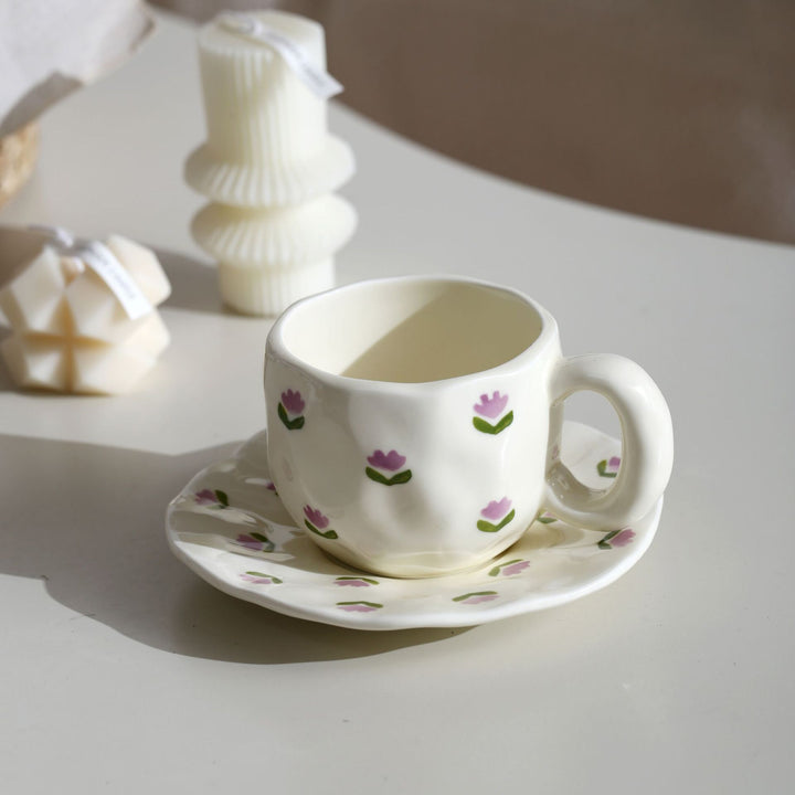 Ceramic mug with hand-painted tulip pattern and organic shape