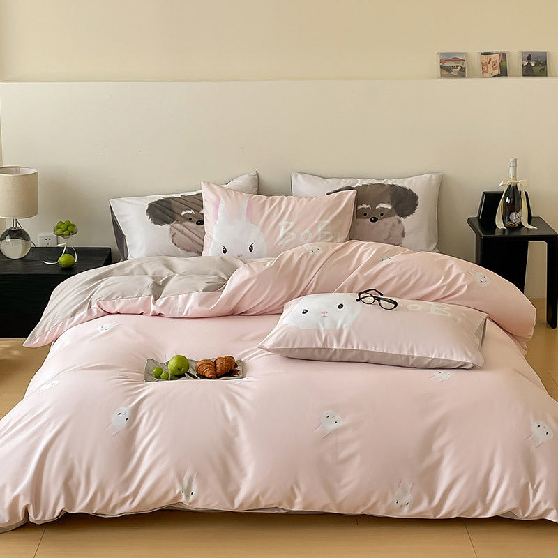Reversible bedding set made of cotton percale with cute bunny motif and fine satin look