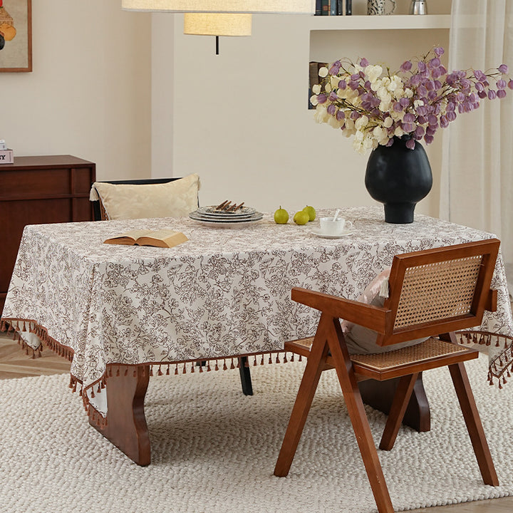 Rectangular high-quality tablecloth made of cotton-linen with hand-printed floral pattern and tassel border