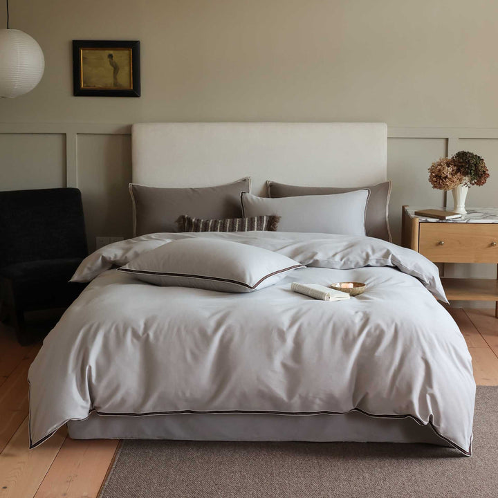 Premium cotton satin duvet cover with piping and hotel closure