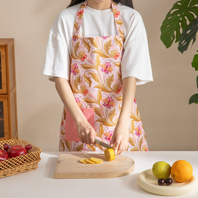 Cotton apron with floral pattern, adjustable neck strap and front pocket