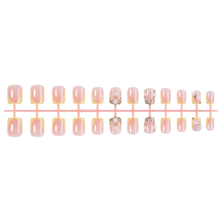 Nail art set with glamorous glitter and flower accents Kalsten