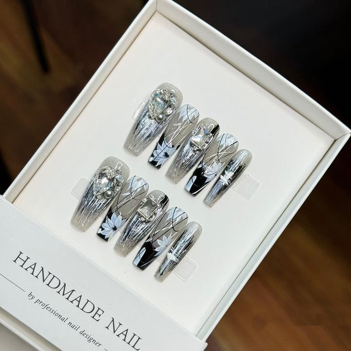 Artistic Handcrafted Press-On Nail Set with Floral and Gem Accents