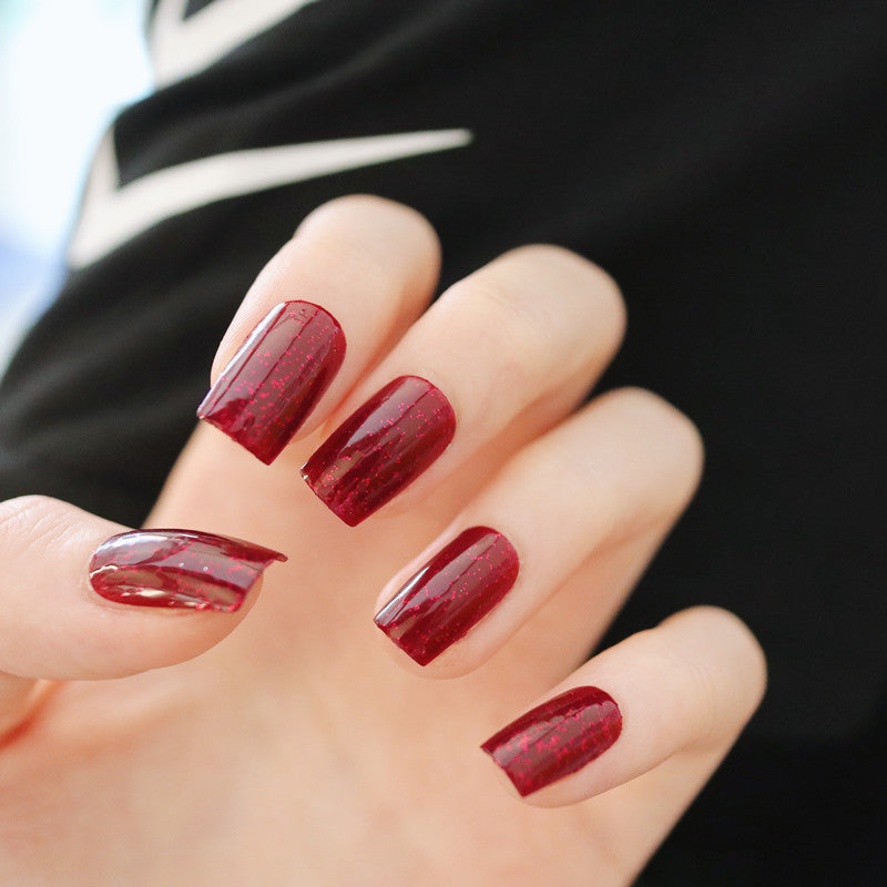 Artificial nails with intense shine and glitter accents Kalsten