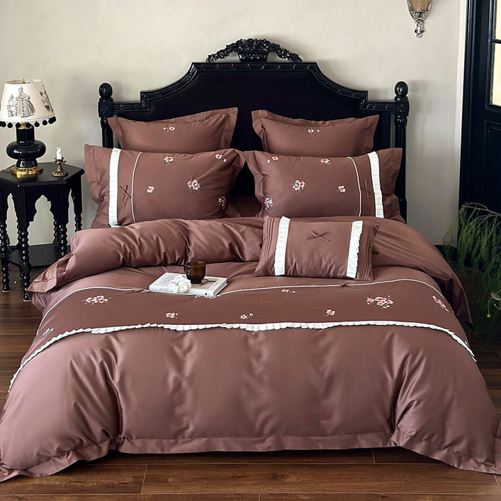 Elegant cotton satin bedding set with fine rose embroidery and pleated ruffle