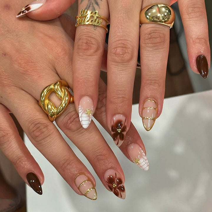 Artful nail art with glamorous accents and elegant embellishments Kalsten