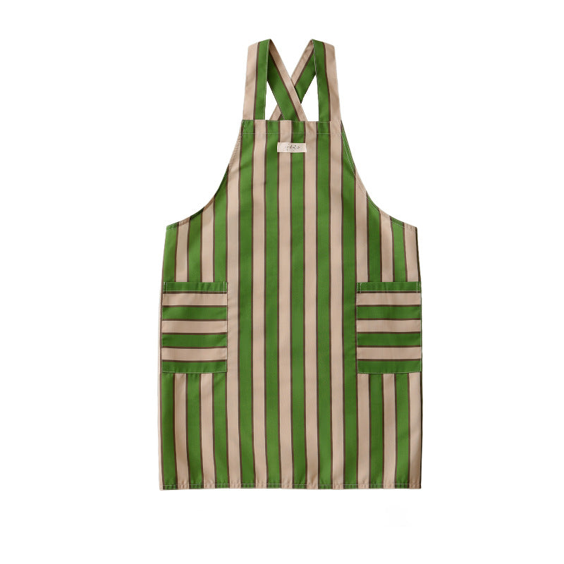 Adjustable kitchen apron with cross straps and patch pockets
