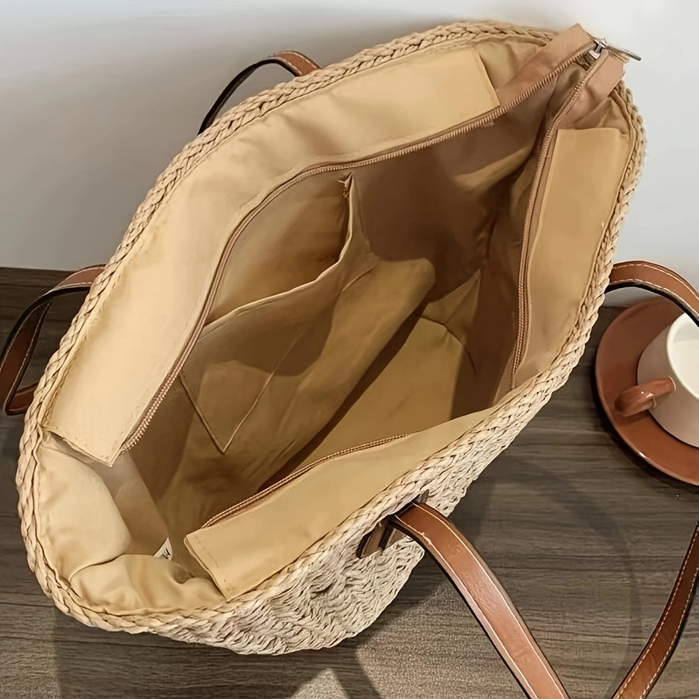 Handbag made of woven natural material with elegant leather handles Kalsten