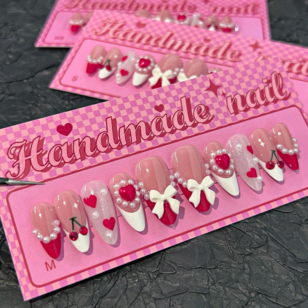 Artful Handmade Nail Art with Hearts and Ribbons Kalsten