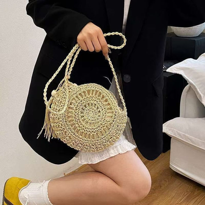 Hand-knotted round shoulder bag made of natural materials Kalsten