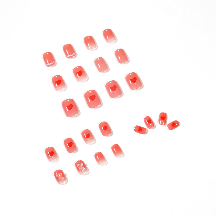 Artful nail art with radiant shine and heart motifs Kalsten
