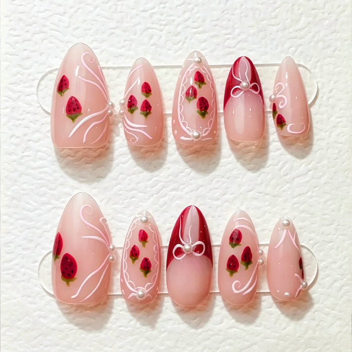 Artificial nail set with romantic strawberry and bow motifs Kalsten