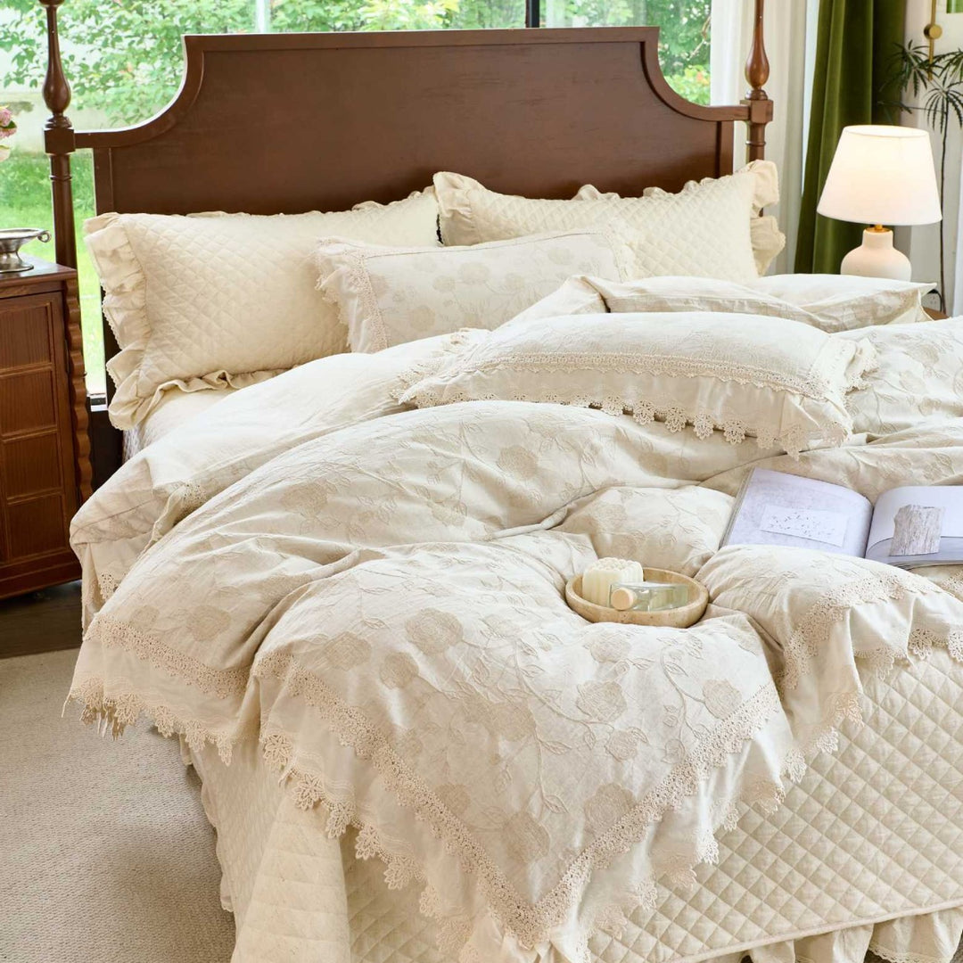Vintage-inspired cotton-linen bedding set with lace trim and quilting pattern