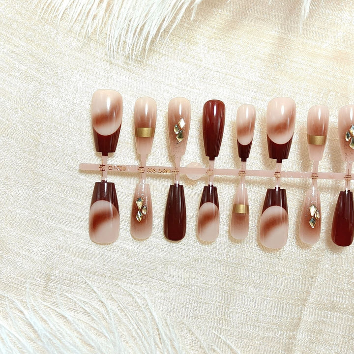 Artificial nails with elegant color gradients and jewelry details Kalsten