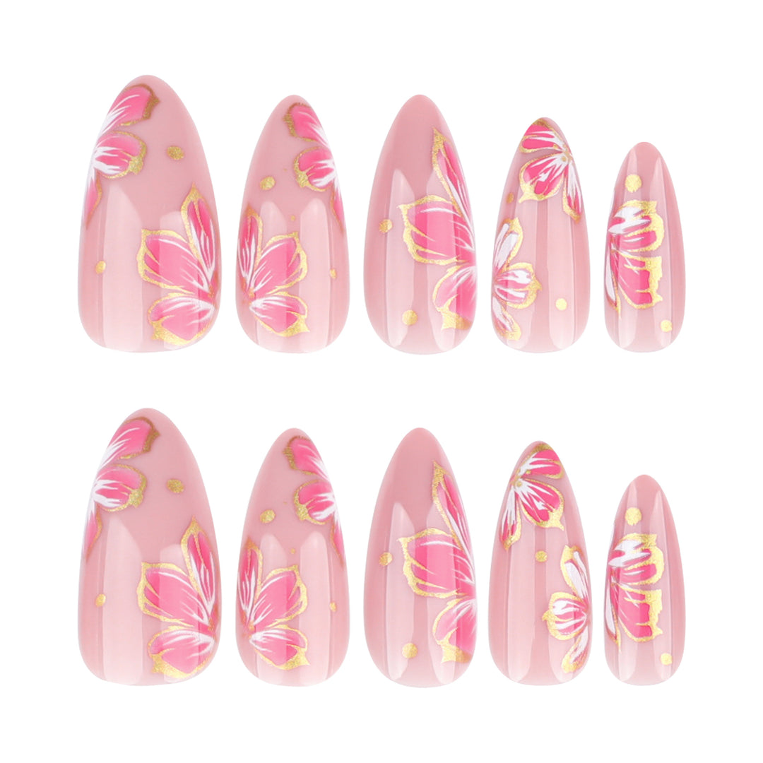 Artful nail art with elegant floral designs and gold accents Kalsten
