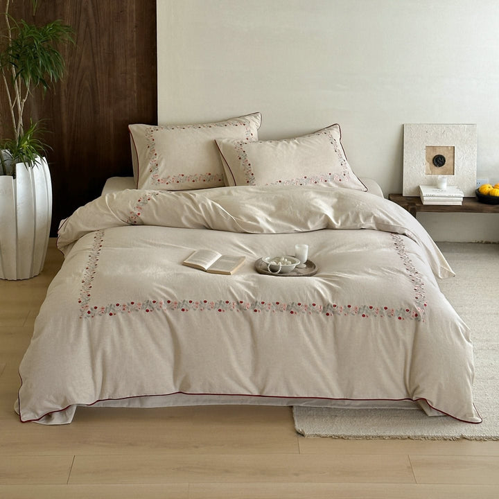 High-quality cotton-linen bed linen set with fine floral embroidery and piping edge