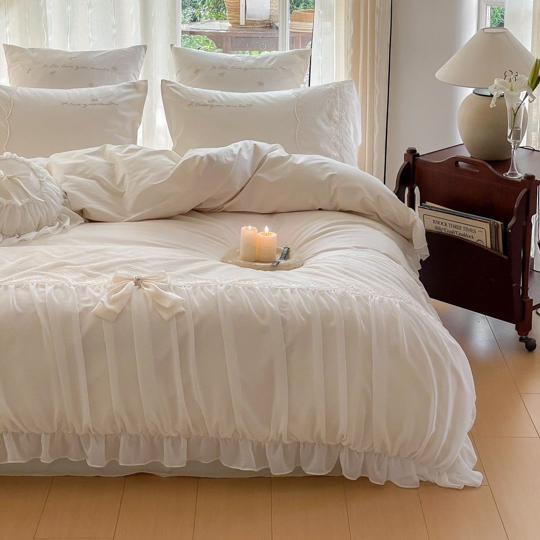 Romantic ruffle duvet cover set with frill, bow appliqué and delicate embroidery