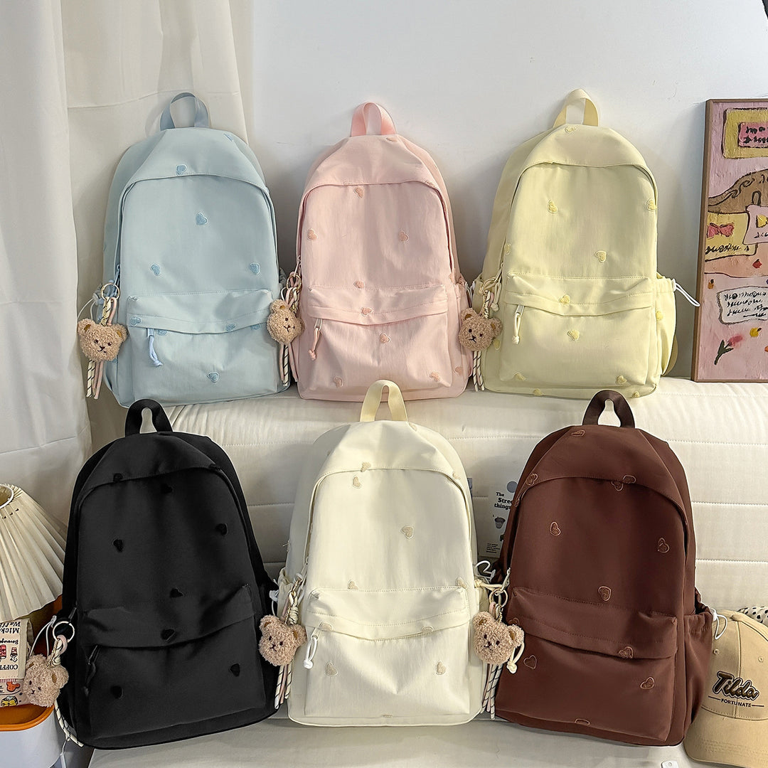 Versatile Casual Backpack with Fun Character Charm Kalsten