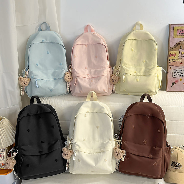 Versatile Casual Backpack with Fun Character Charm Kalsten