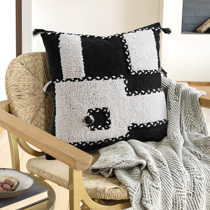 Square hand-tufted decorative pillow with geometric high-pile relief