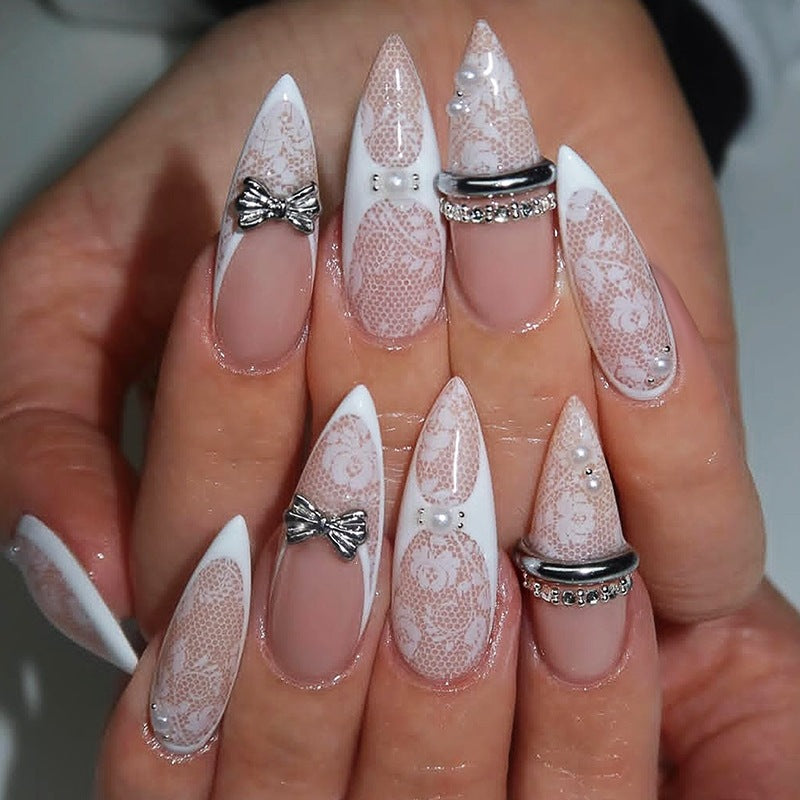 Nail art set with intricate accents and glamorous decorations Kalsten
