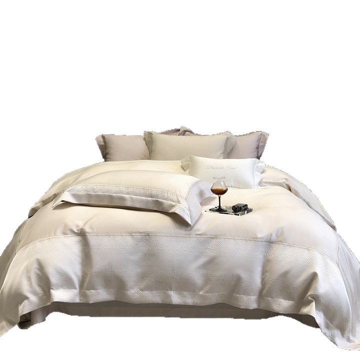 Premium cotton satin bedding set with structured matelassé border and hotel closure