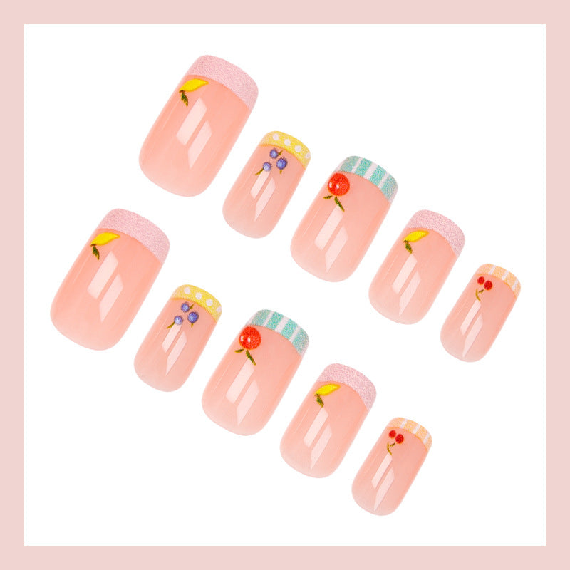 Nail art set with cheerful fruit designs and colorful accents Kalsten