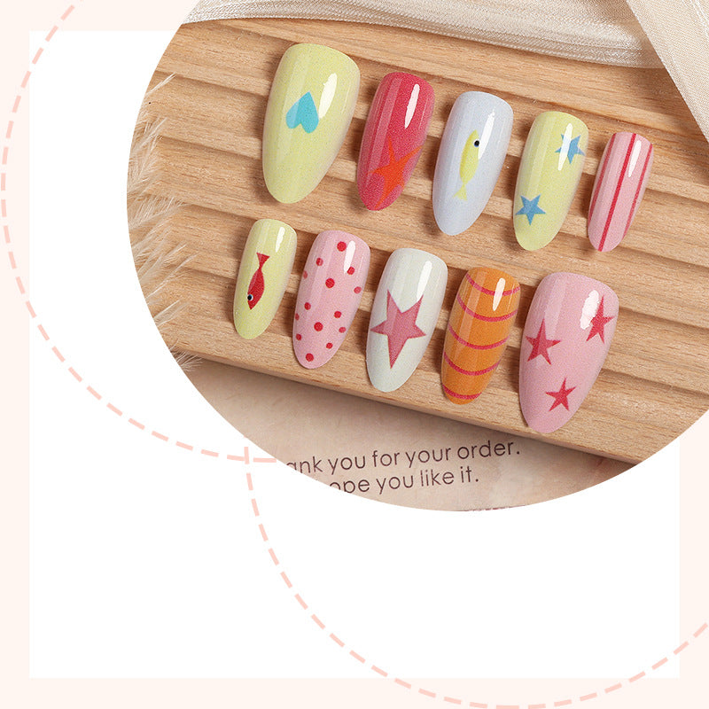 Creative nail set with colorful designs and maritime motifs Kalsten
