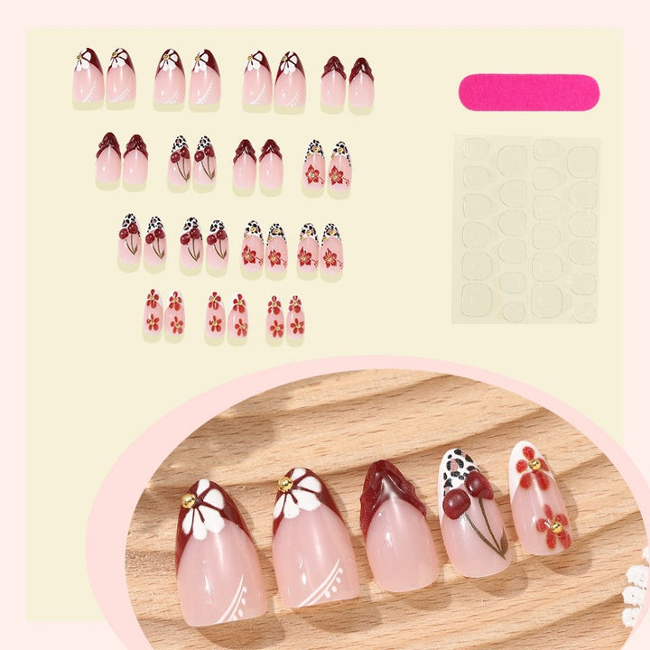 Artificial nail set with floral 3D designs and elegant accents Kalsten
