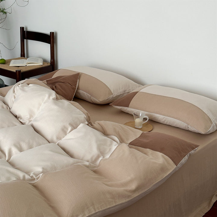 Duvet cover and pillowcase set made of cotton satin with quilted patchwork look and extra soft touch