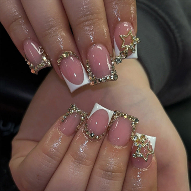 False nail set with glitter accents and holiday design Kalsten