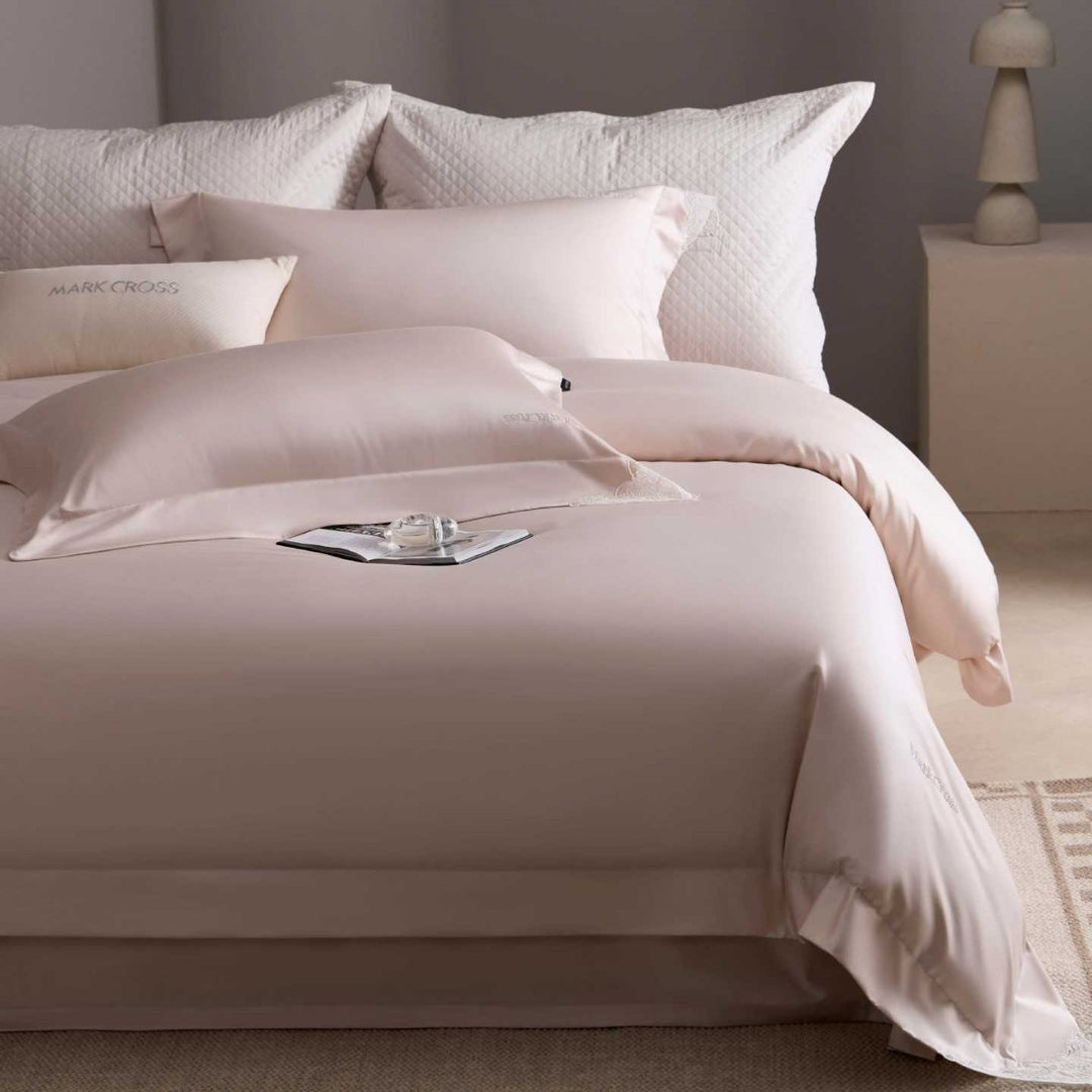 Luxurious cotton satin bedding set with delicate lace trim and hotel finish