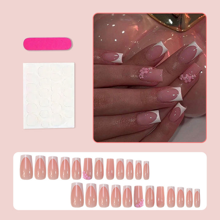 Acrylic nail set with elegant French tips and decorative accents Kalsten