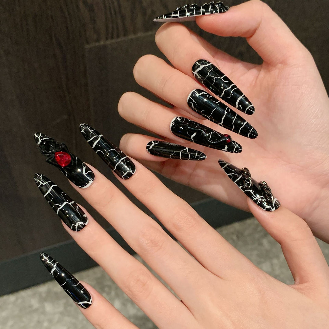 Artistic Press-On Nail Set with Modern Black Marble Design