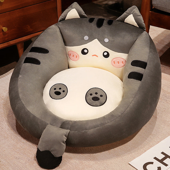 Plush pet bed with raised edge and removable cuddly pillow
