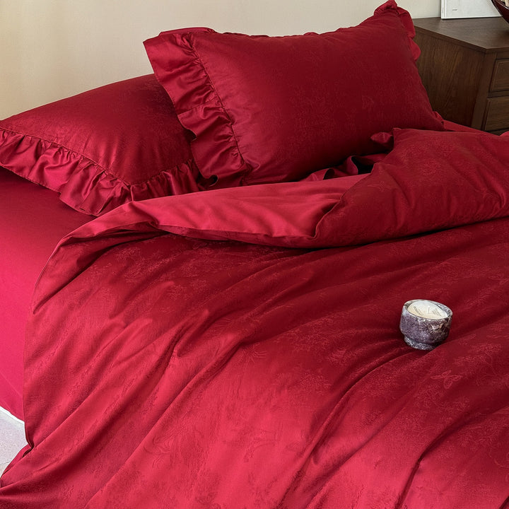 Bedding set with ruffled hem, woven floral jacquard and luxurious cotton satin quality