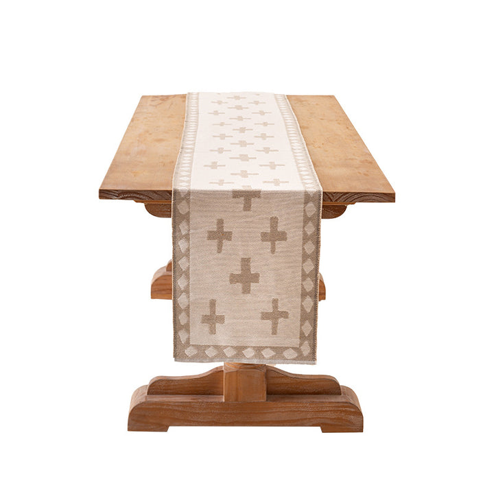 Woven table runner in graphic block stripe design with light cotton texture