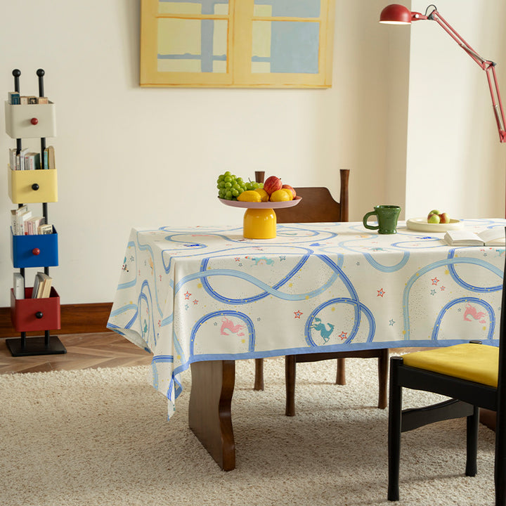 Rectangular cotton blend tablecloth with playful stripe and animal print