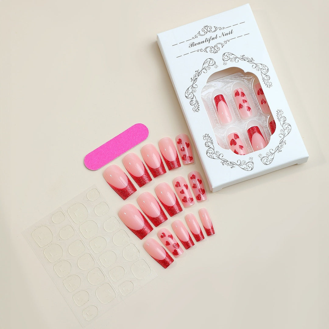 Artificial nail set with romantic heart designs and glitter accents Kalsten