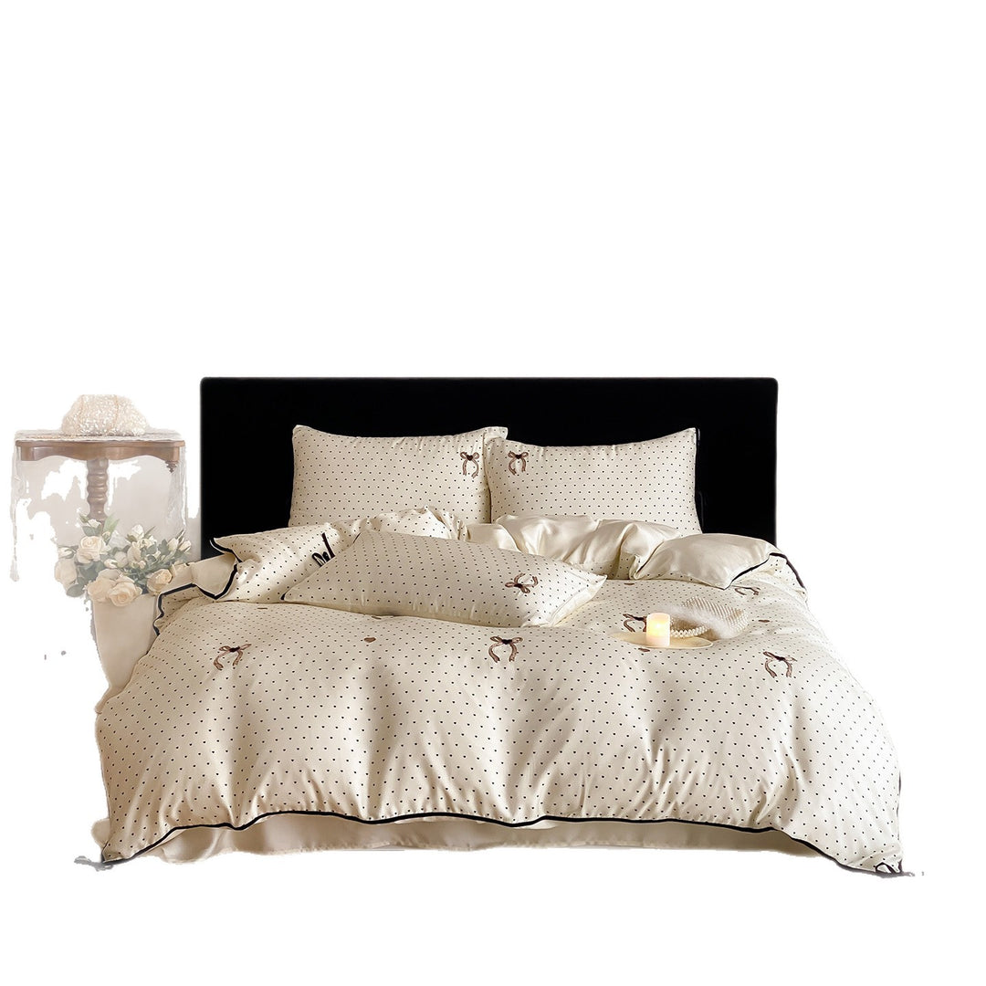 Luxurious satin bedding set with delicate polka dots and bow embroidery