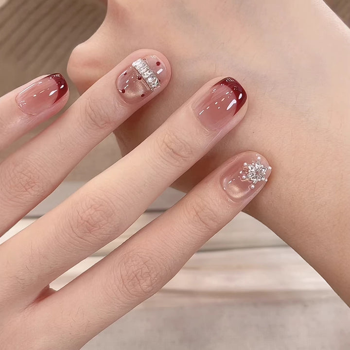 Elegant Rhinestone-Embellished Nail Art Kalsten