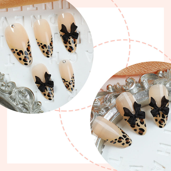 Creative nail set with leopard design and glitter accents Kalsten