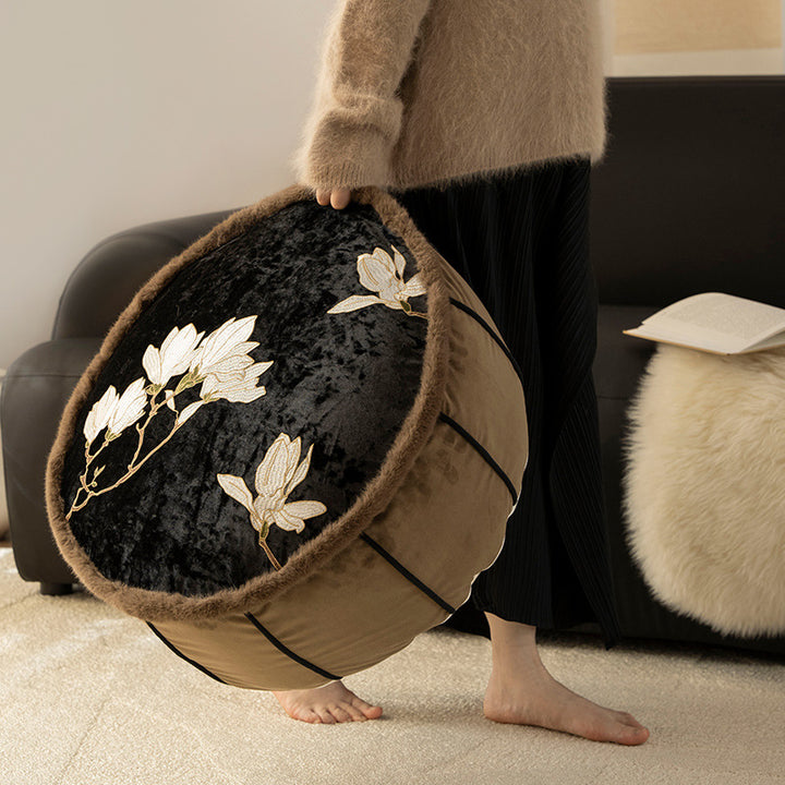Seat pouf made of embroidered velvet with faux fur trim