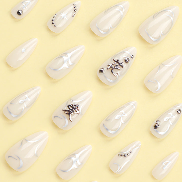 Artistic acrylic nails with elegant glitter patterns Kalsten