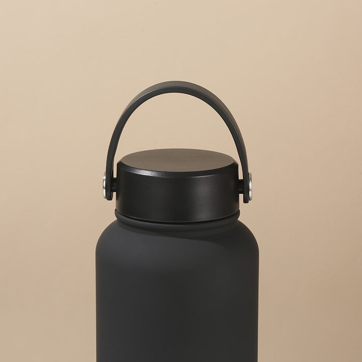 Women's double-walled insulated water bottle with practical carrying handle Kalsten