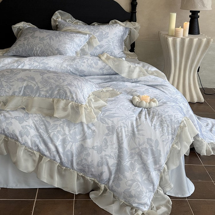 Elegant bedding set made of fine satin jacquard with delicate floral relief and decorative ruffle