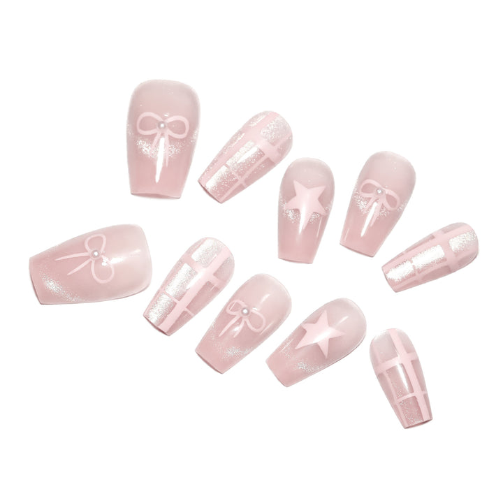 Artistic acrylic nails with elegant bow and star designs Kalsten