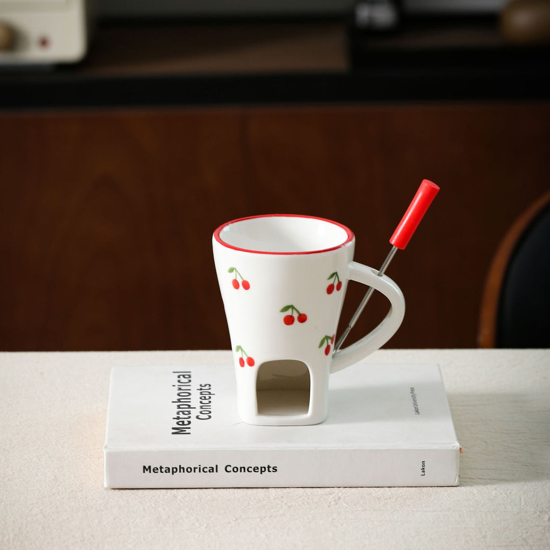 Ceramic mug with integrated tea strainer and silicone drinking straw