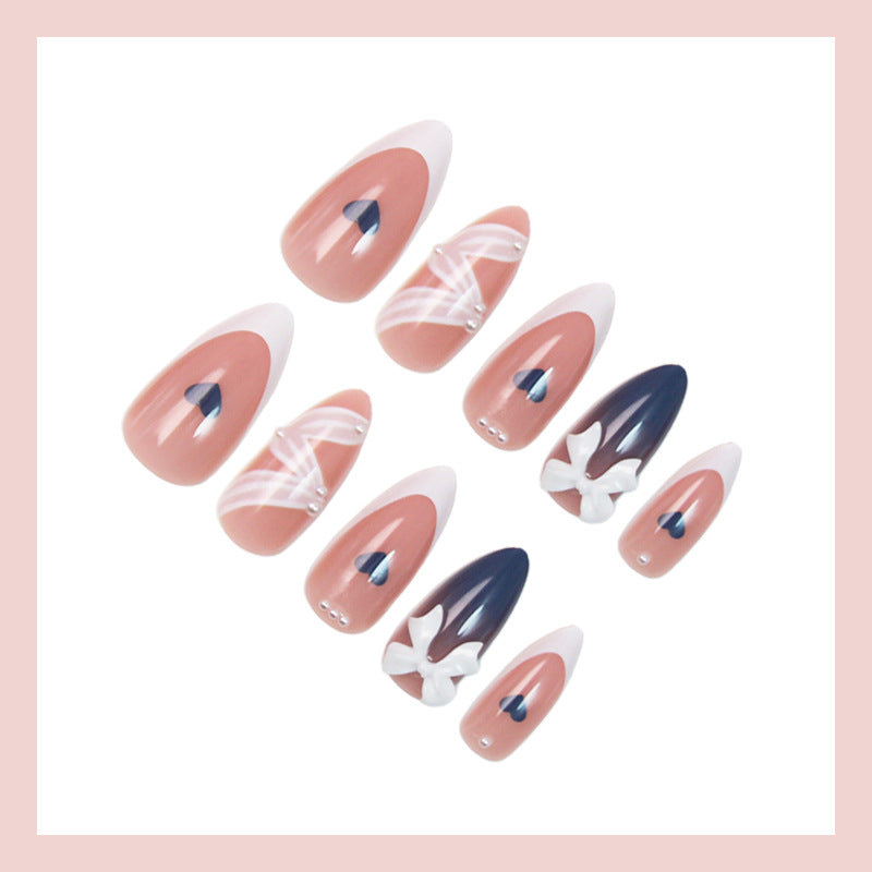 Artificial nail set with elegant bows and heart-shaped accents Kalsten